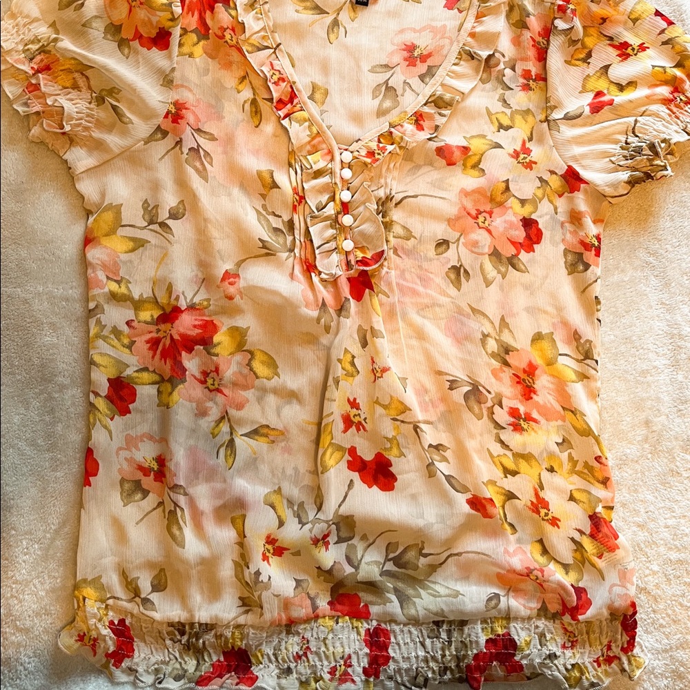 Reitmans Semi-sheer floral short-sleeved blouse, size Medium.